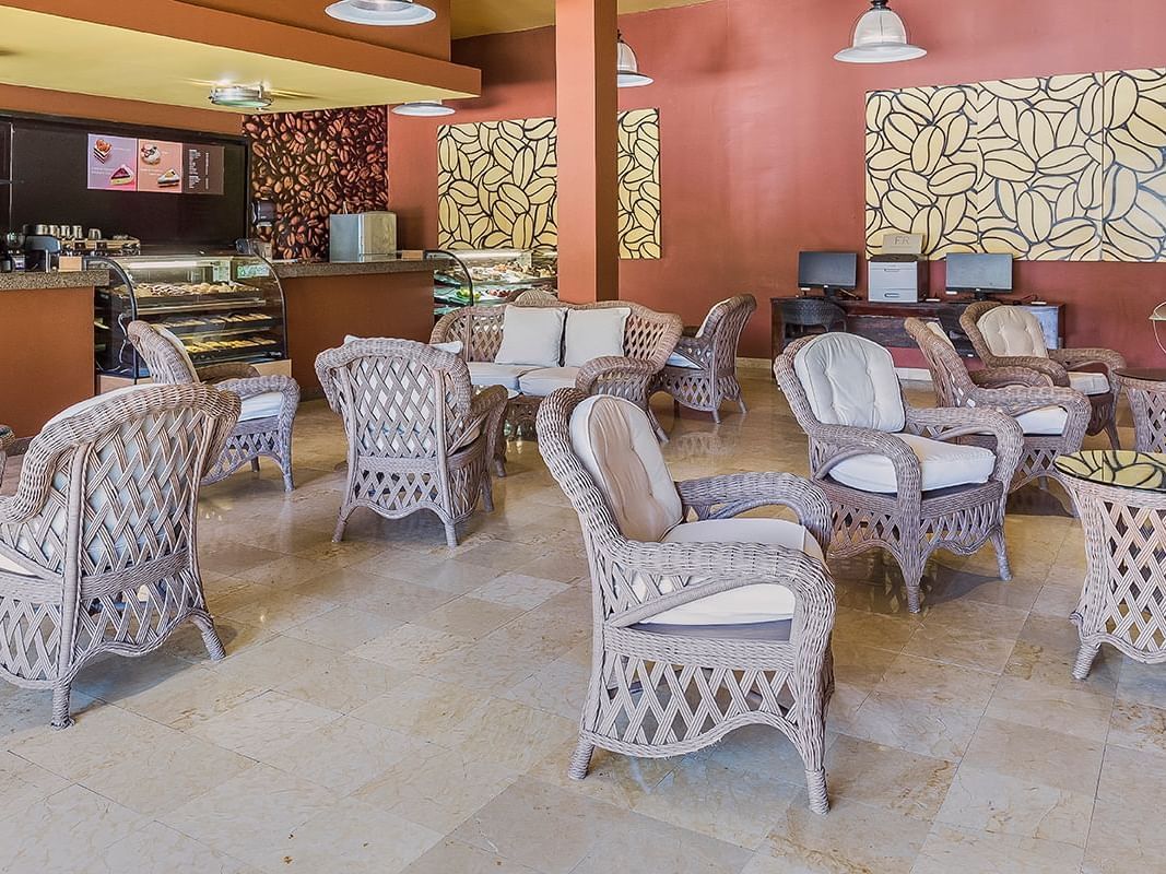 Vintage-style chairs in a restaurant at La Colección Resorts