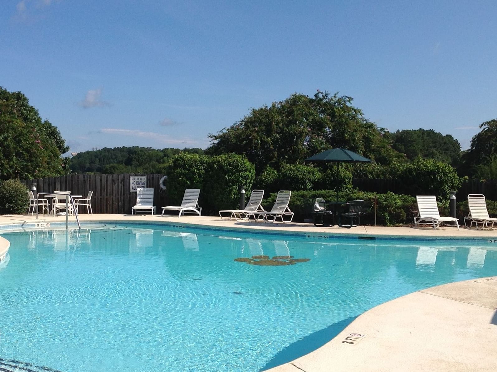 View of pool and chairs