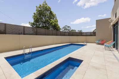 An outdoor pool area, Nesuto Parramatta Sydney Apartment Hotel
