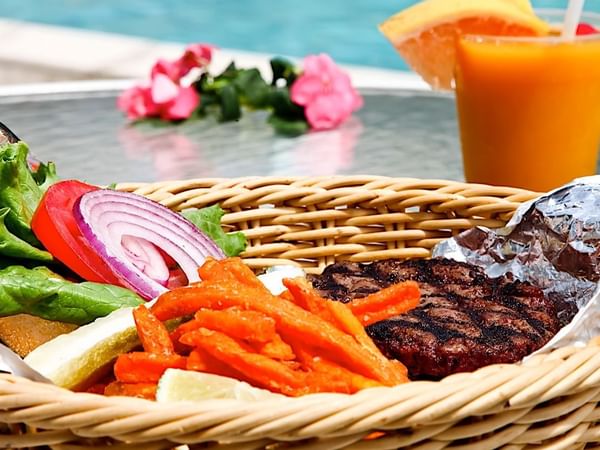 Veggies and burger with cocktail at Safety Harbor & Resort