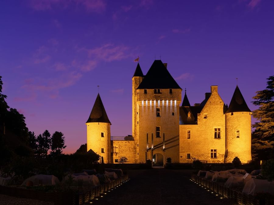 Exterior view of the Chateau du Rivau at night 