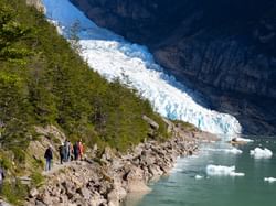 People hiking through Glaciers near The Singular Patagonia