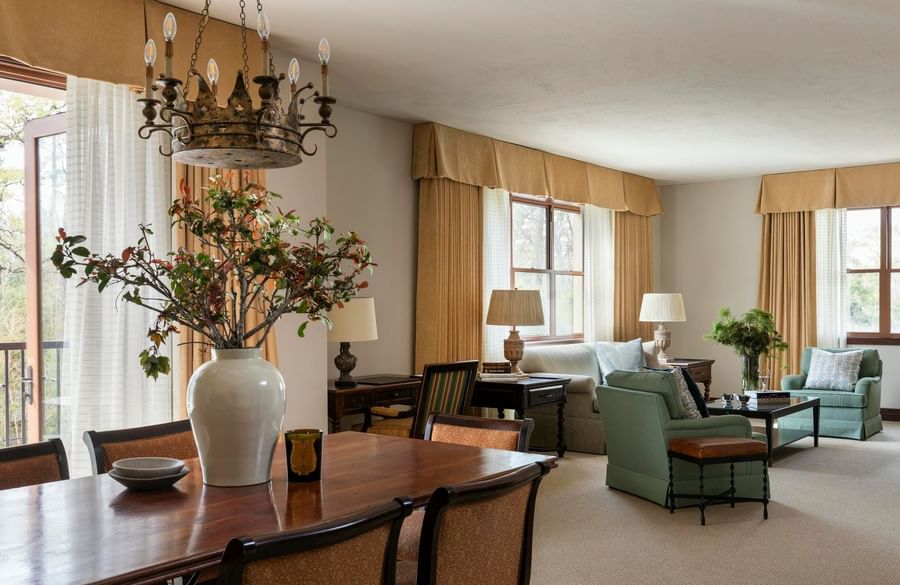 Bright living and dining area at Granduca Houston, one of the best apartment hotels in Houston, featuring elegant décor