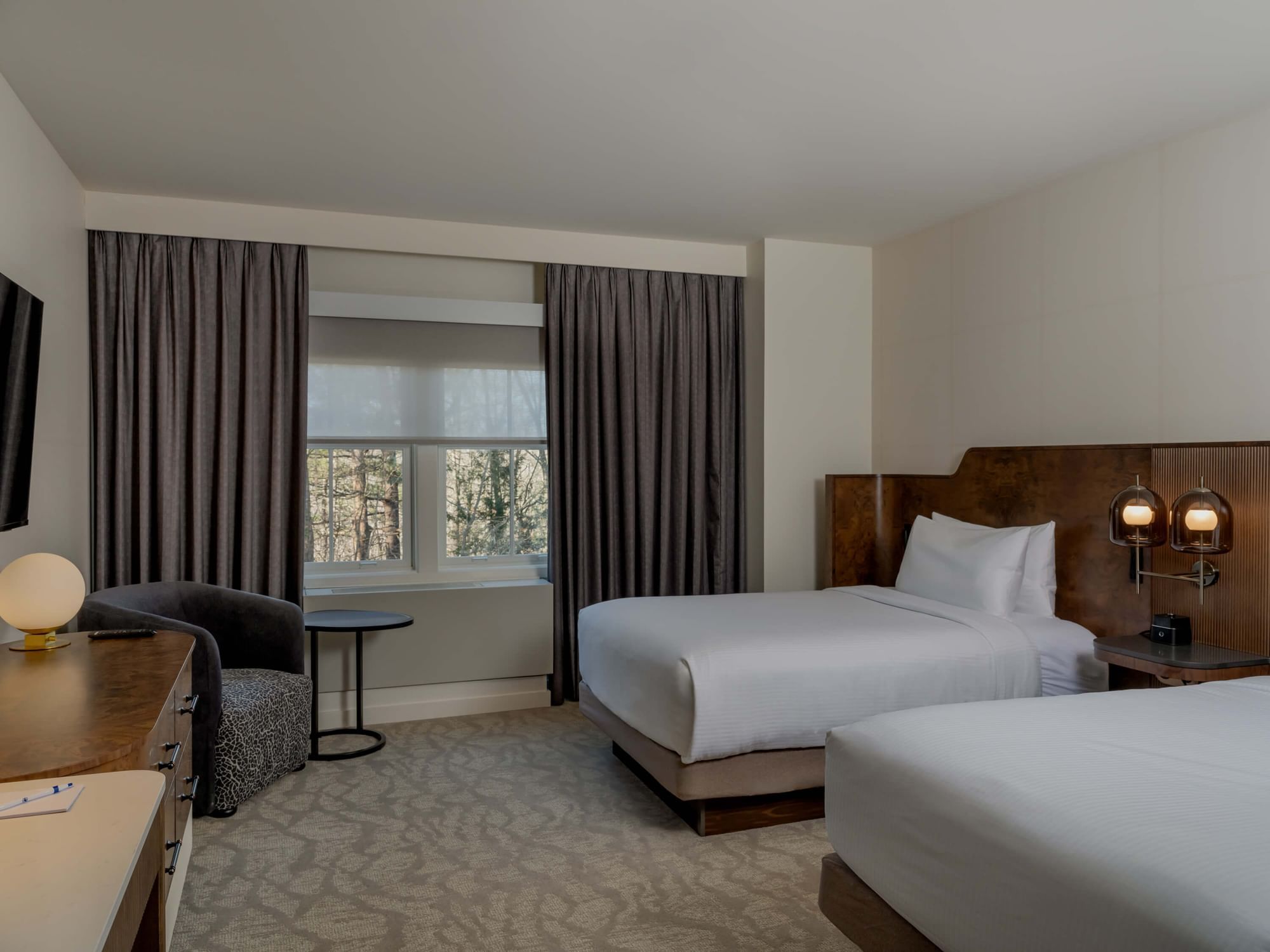 Window lounge by the bed in Accessible Suite at Hotel Brookmere