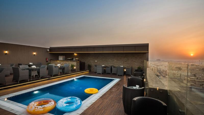 Rooftop pool with Inflatable Rings at Naviti By Warwick Dammam