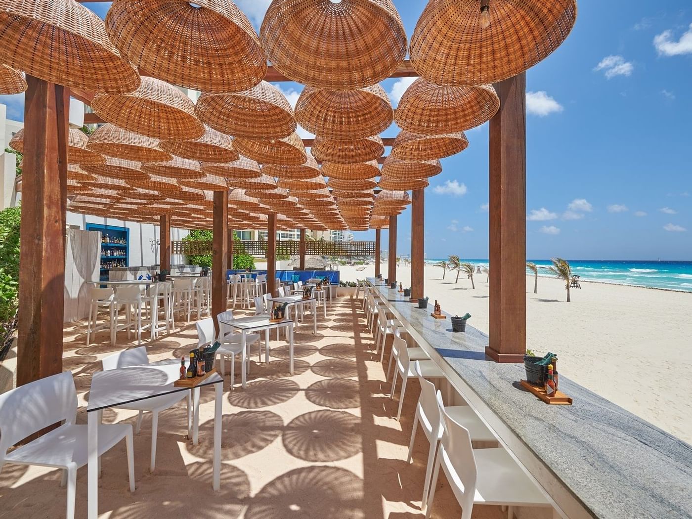 The Sea Corner dining area near the beach at Live Aqua Beach Resort Cancun