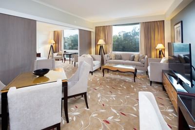 Living and dining area in a room at Royal on the Park hotel