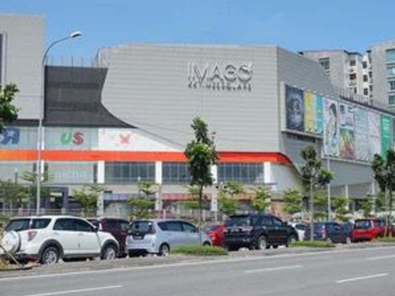 Imago Shopping Mall with parked cars in the foreground near Cititel Express Kota Kinabalu