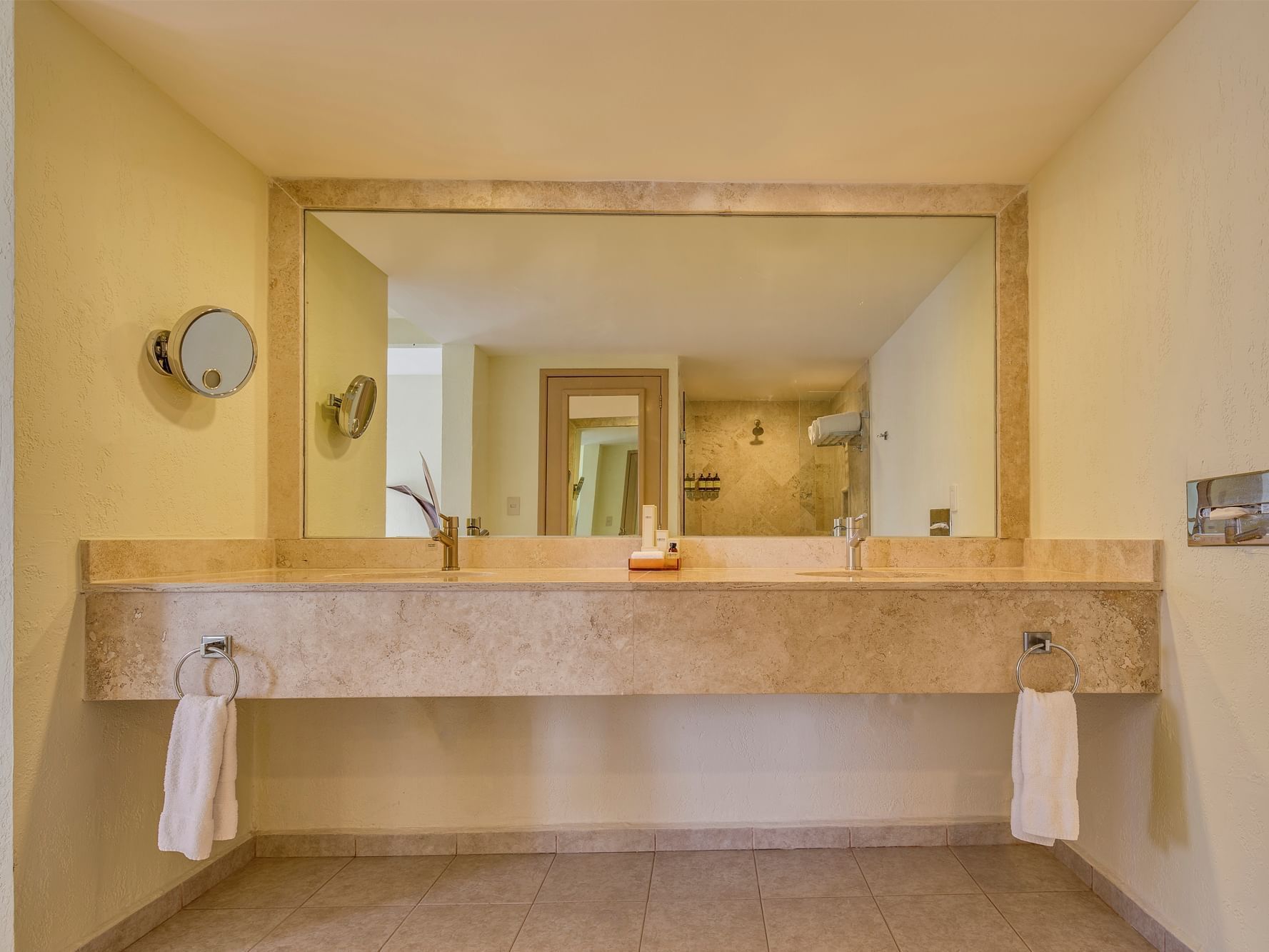 Washbasins with large mirror in Master Suite at La Colección