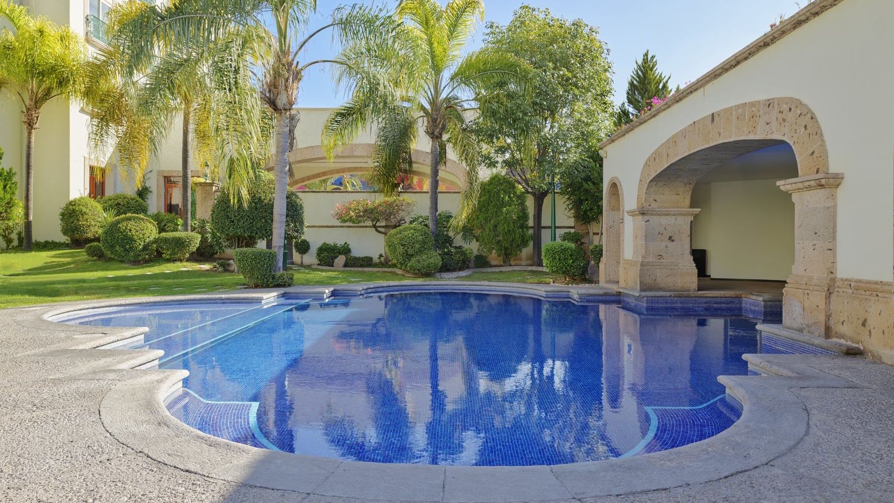 Modern designed outdoor pool and garden at FA Aguascalientes