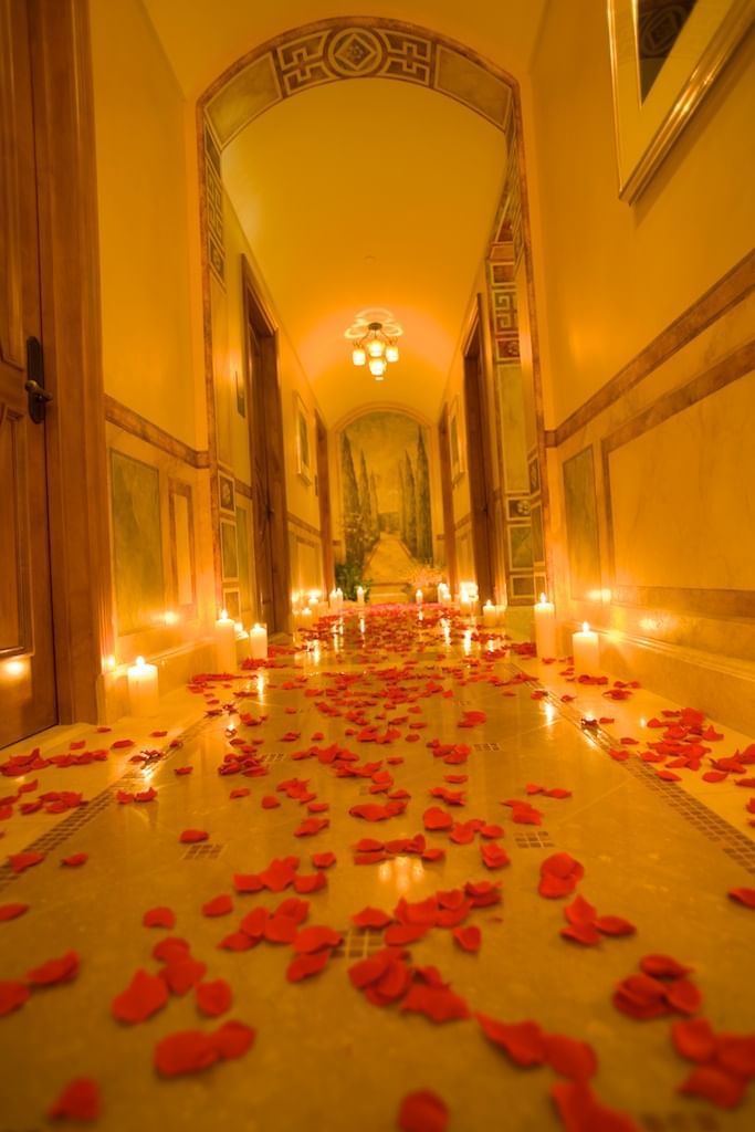 Hallway decorated with candles & roses at Mission Inn Riverside