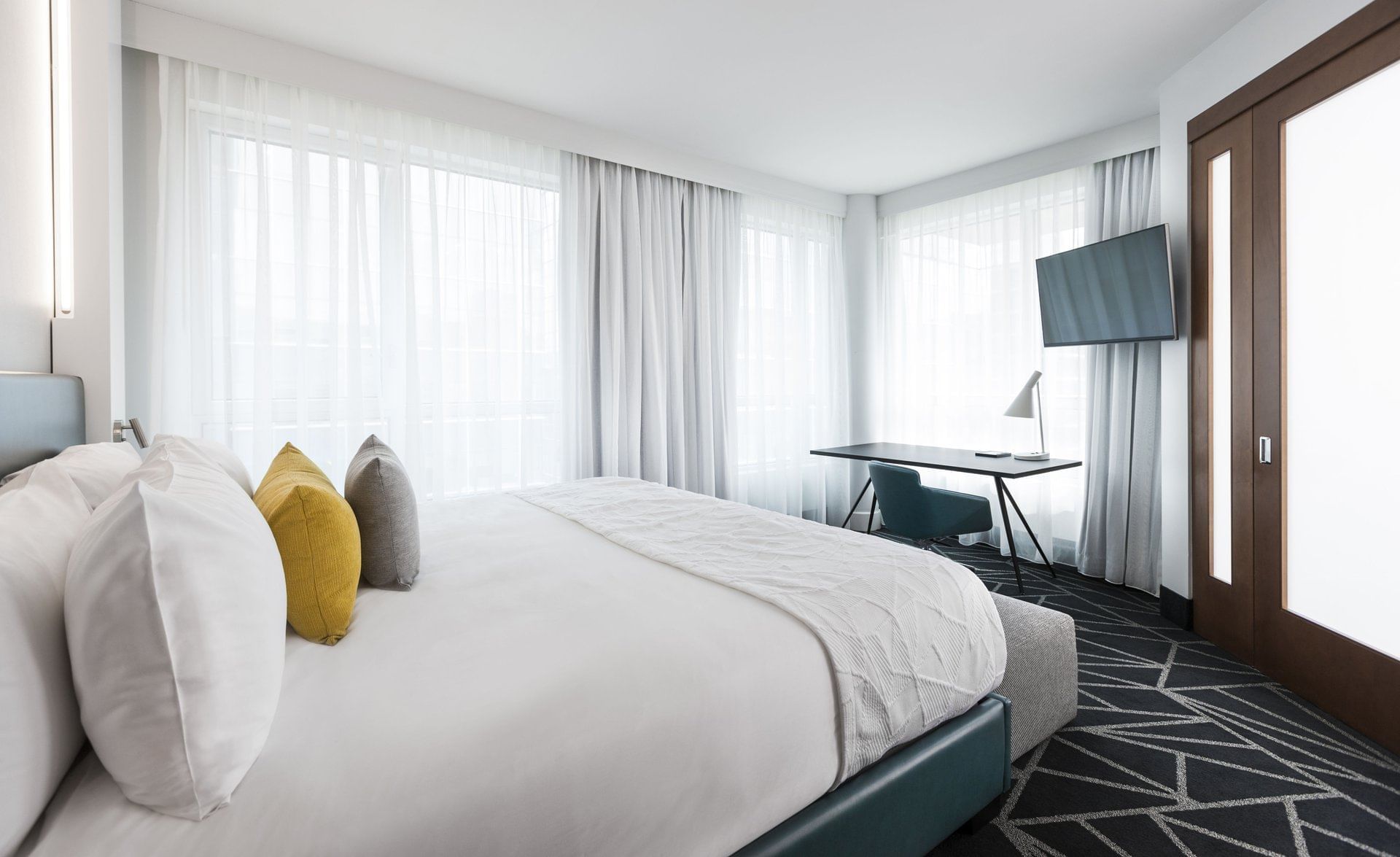 Warwick Premier Suite with workspace at Warwick Le Crystal