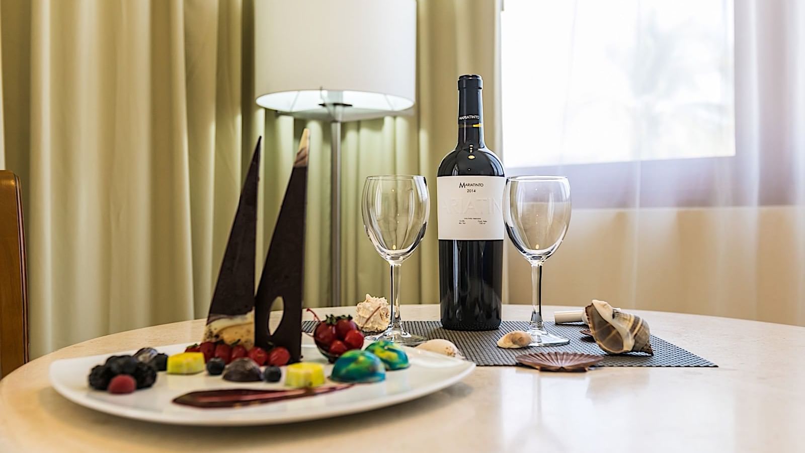 Fruit platter and wine given in Junior Suite King Ocean View Room at Pierre Mundo Imperial