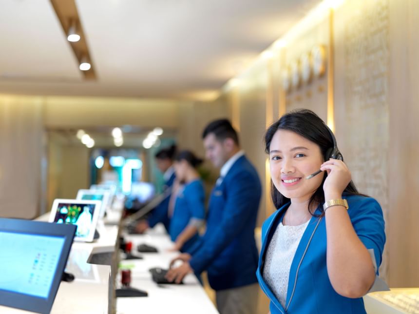 A receptionist on a call at 2 Seasons Hotel & Apt