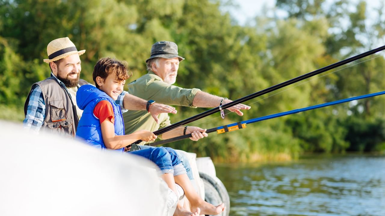 Family fishing on a boat tour