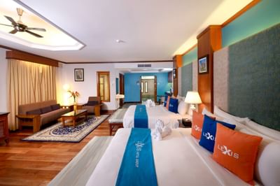 Grand Garden Pool Villa (Lower Unit) with twin king-sized bed and lounge space - Grand Lexis Port Dickson
