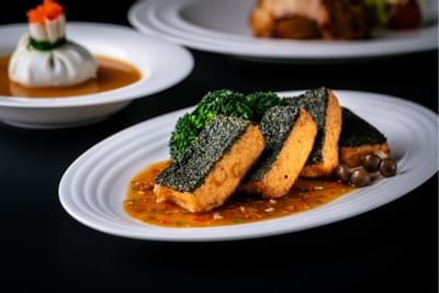 Fried spinach, tofu served at Carlton Hotel Bangkok Sukhumvit