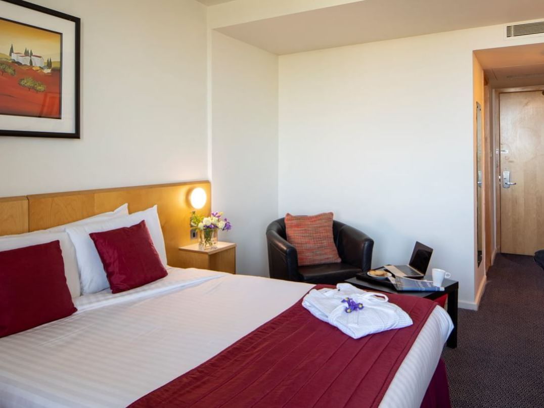 Bed & furniture in Executive Rooms at St. Giles Heathrow Hotel