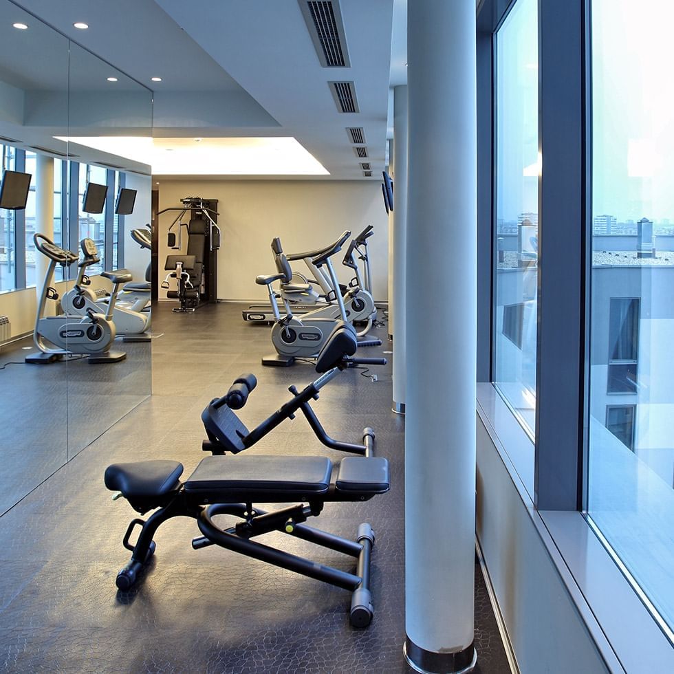 Exercise machines in the gym at Falkensteiner Hotels