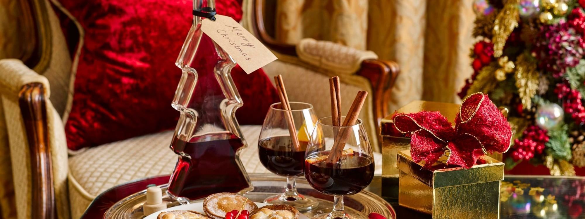 Bottle and cups of wine with pastries at the Restaurant at the Capital