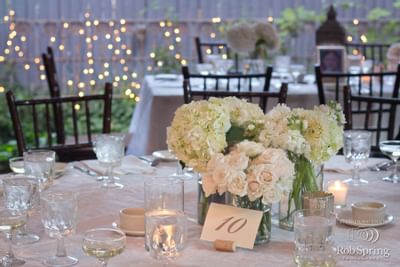Close-up of a table with wedding decor at The Inn at Saratoga
