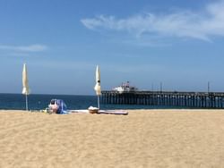 beach with pier in background