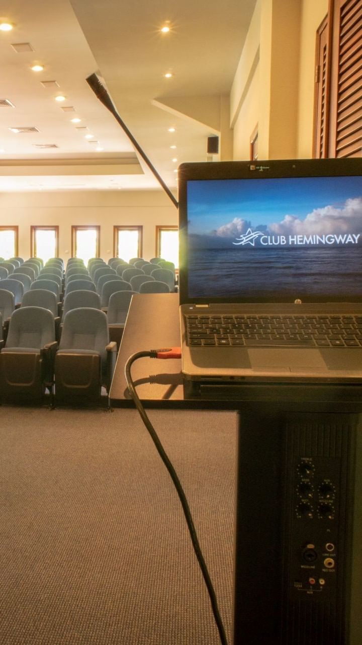 A laptop set-up for a meeting at Club Hemingway