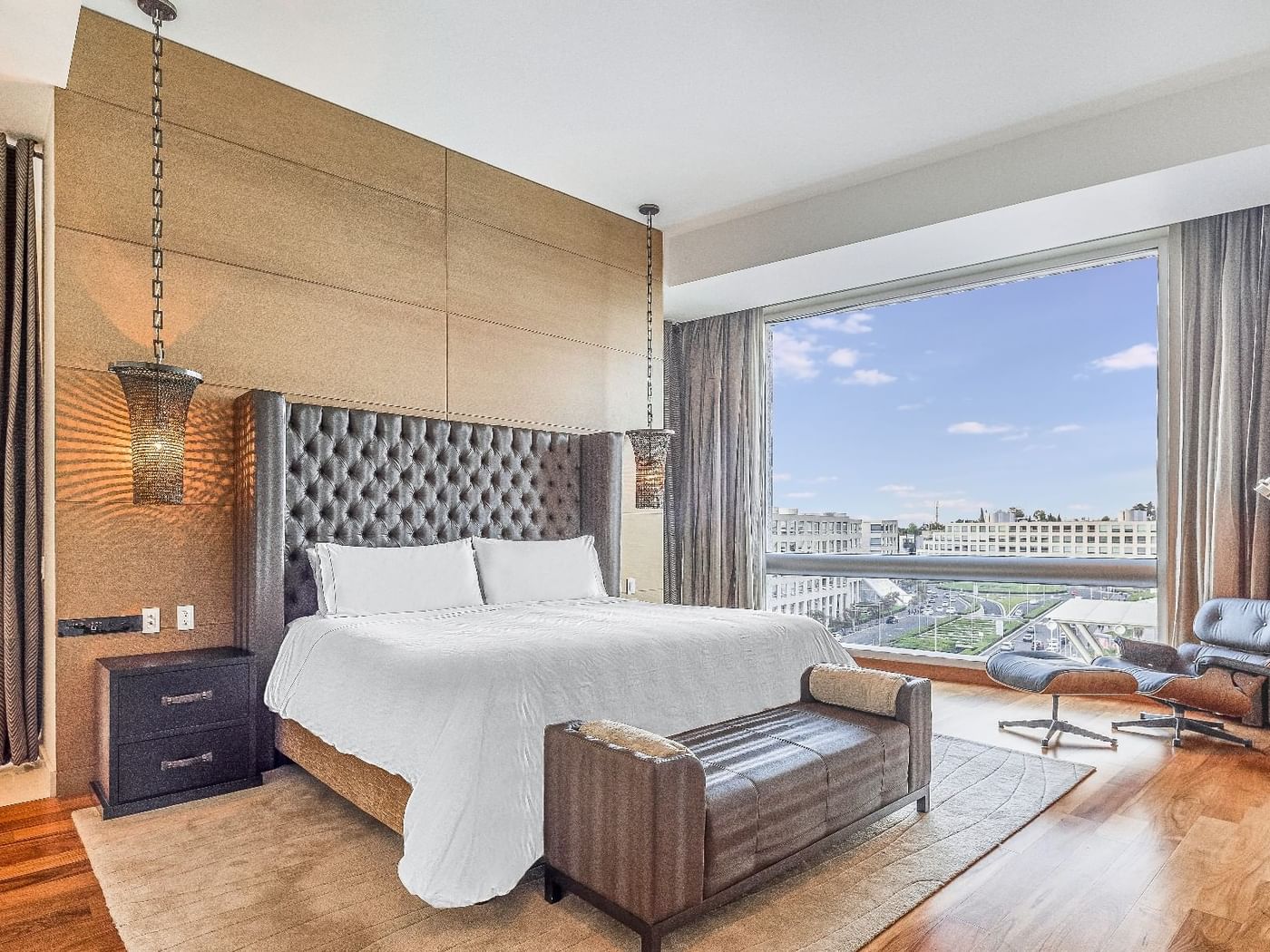 Comfy bed in Sol Presidential Suite at Fiesta Americana Travelty