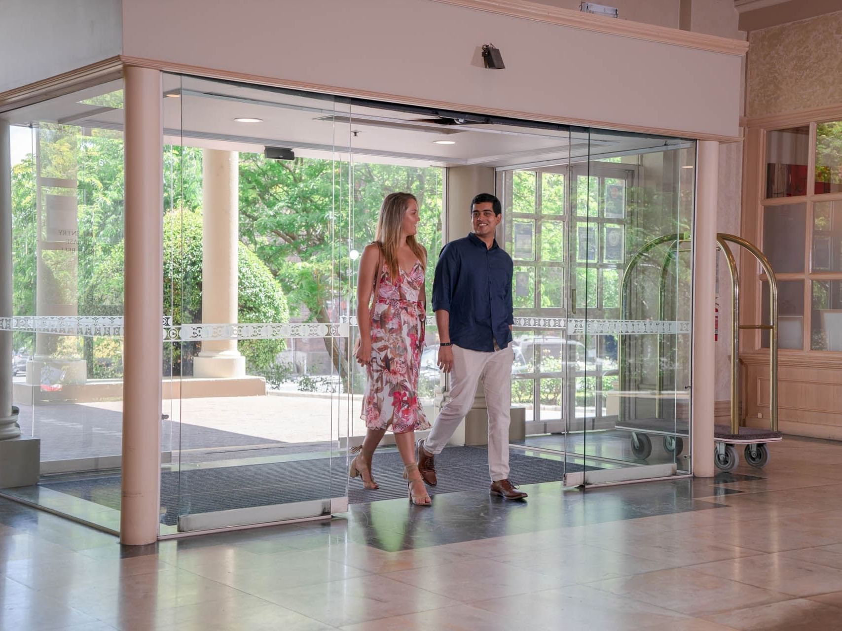 Couple entering through the main entrance at Grand Chancellor Launceston