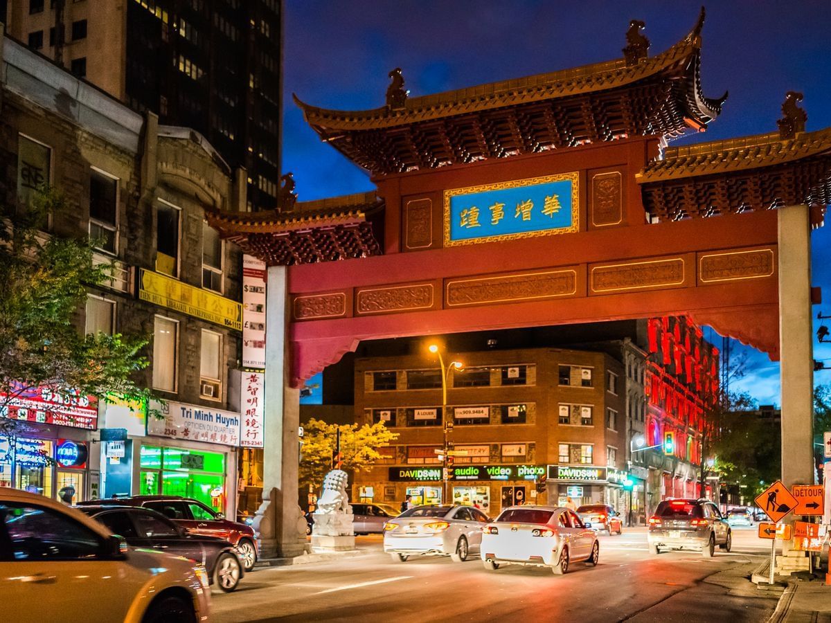 Street view of Chinatown near Travelodge Montreal Centre at night