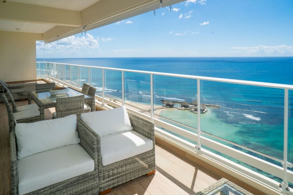 Balcony lounge area with ocean view at Club Hemingway