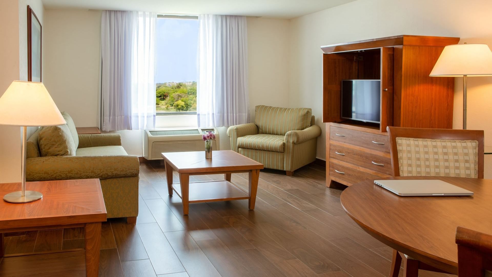 Living room in a junior suite at Fiesta Inn Tampico