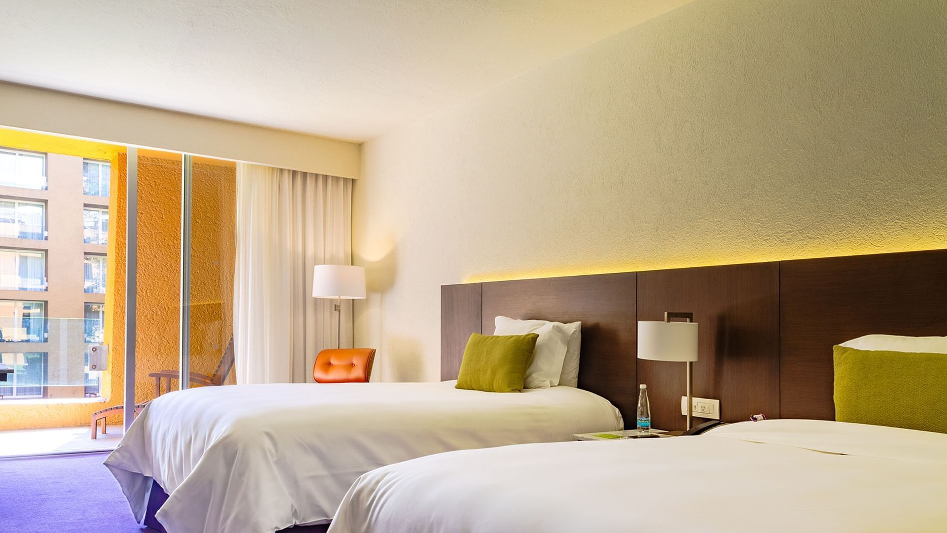 2 Double Superior Deluxe Garden View featuring white linens and a private balcony view at Camino Real Polanco Mexico