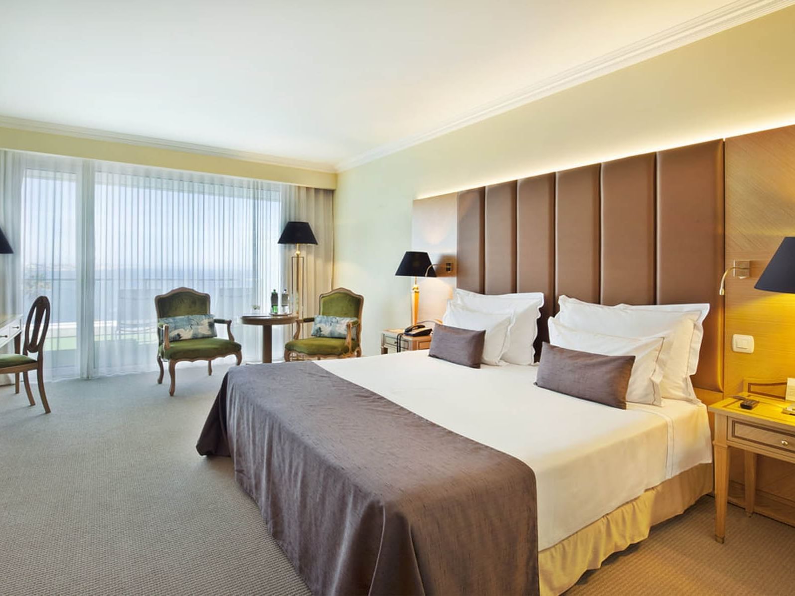 Elegant room with premium sea and pool view at Hotel Cascais Miragem Health & Spa in Cascais.