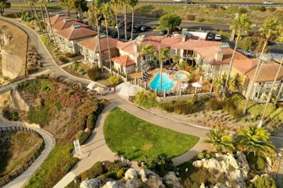 Aerial view of hotel grass and pool