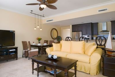 Living room with sofa in 4 Bed Penthouse Oceanfront Suite at Windsong Resort On The Reef