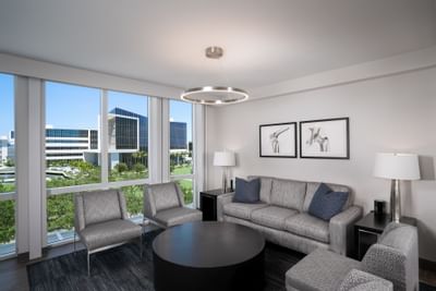 Interior view & sofa set-up in Parlor Room at Innovation Hotel