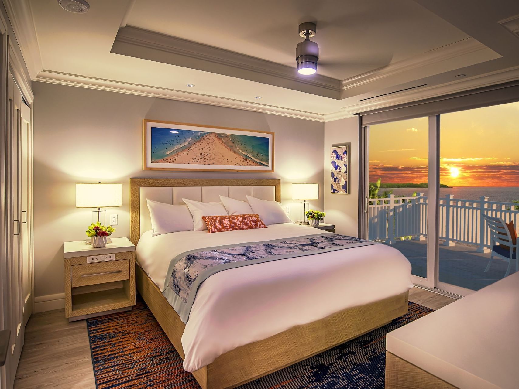 King bed in Corner Balcony Harbor View King at Sunseeker Resort