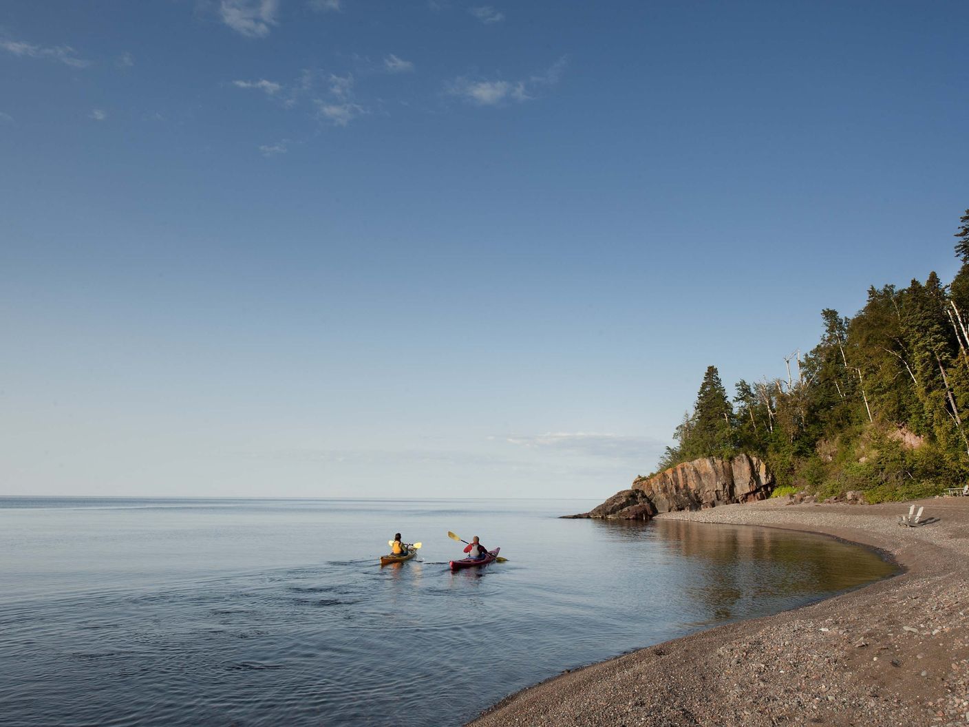 Two people kayaking near Lutsen Resort