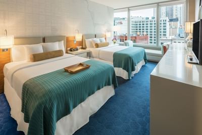 Two beds in Deluxe Double Queen Room at Kinzie Hotel