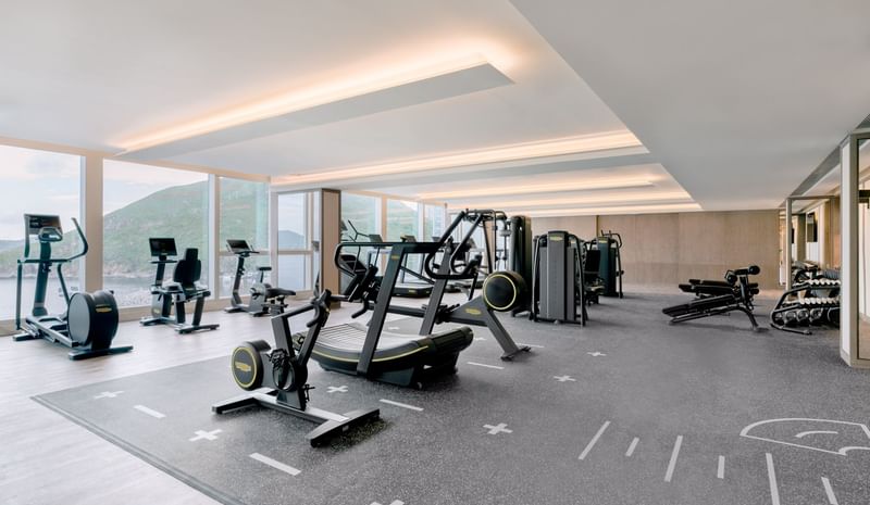 Exercise machines lined up in The Gym at Fullerton Ocean Park Hotel Hong Kong