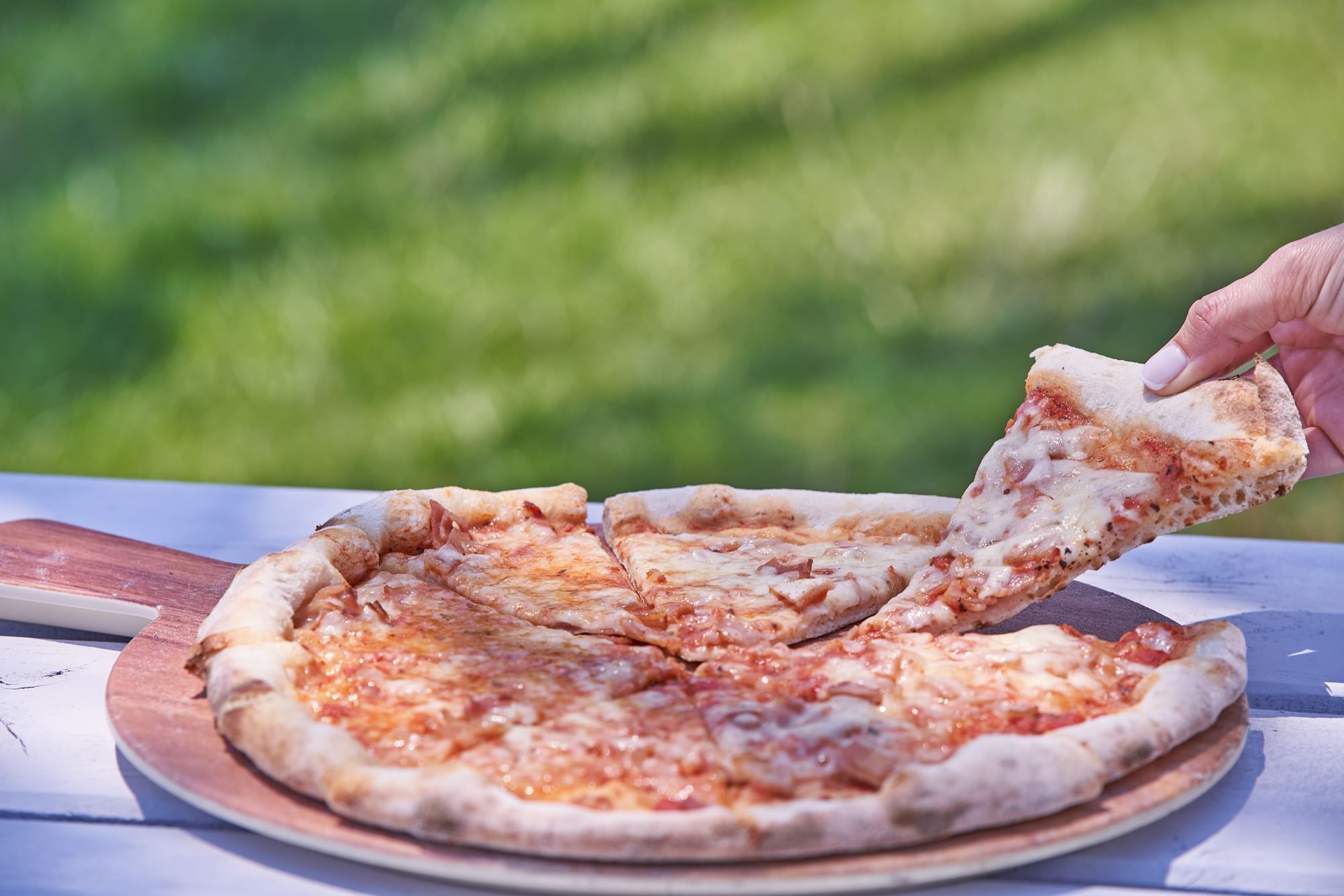 Close up of a pizza in Pizza restaurant at Kiotari Miraluna
