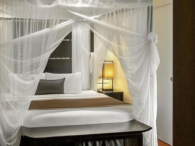 A canopy bed in Verandah Studio at Amara Sanctuary Resort