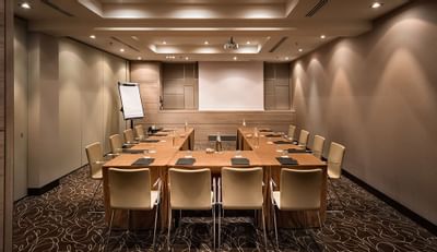U-shaped table set up in a Meeting room at Uptown Palace Milan