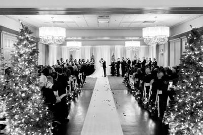 Wedding ceremony with Christmas decors at Ethan Allen Hotel