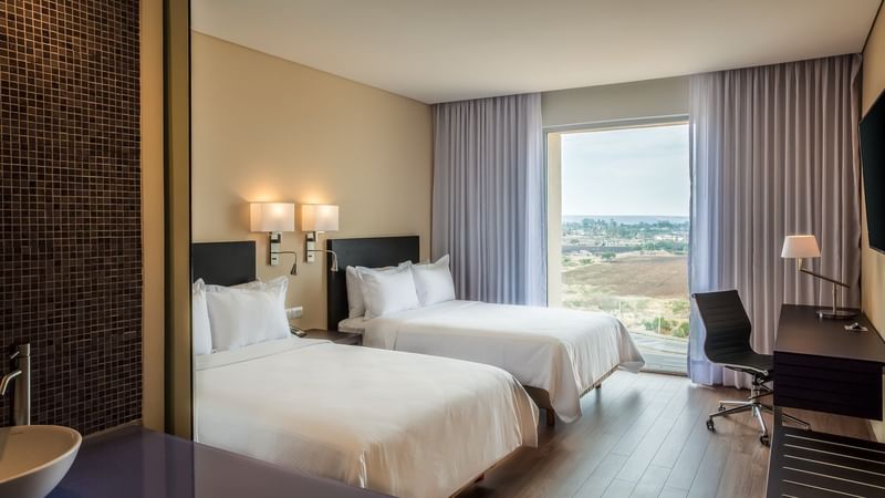 Twin beds in Superior Room at Fiesta Inn Silao Puerto Interior