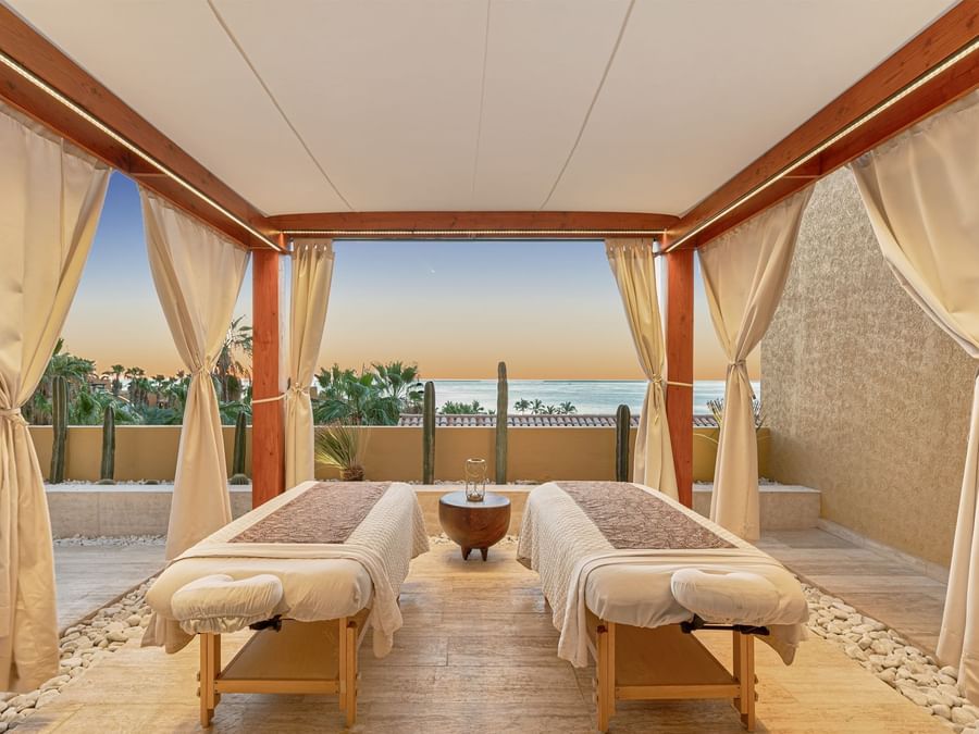 Outdoor massage cabin with spa beds with ocean view at Grand Fiesta Americana