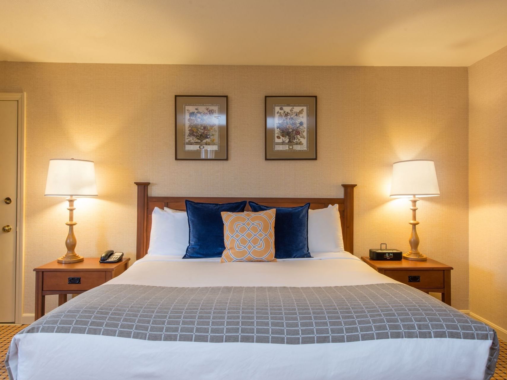 Close up on the king bed in the Mini Suite at Wolfeboro Inn
