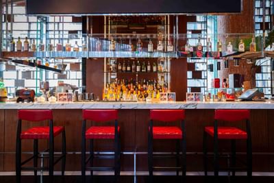 View of the Opera Bombana bar counter at Hotel Éclat Beijing