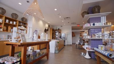Shelves stocked with a variety of items in a store at The Fredonia Hotel